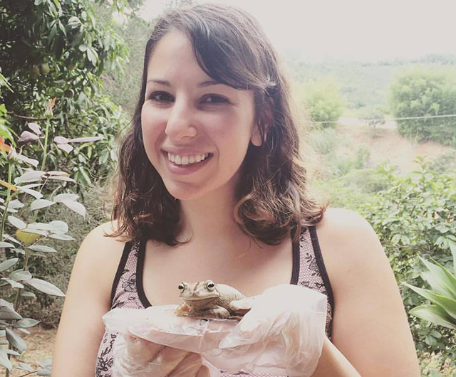 Anat holding a frog