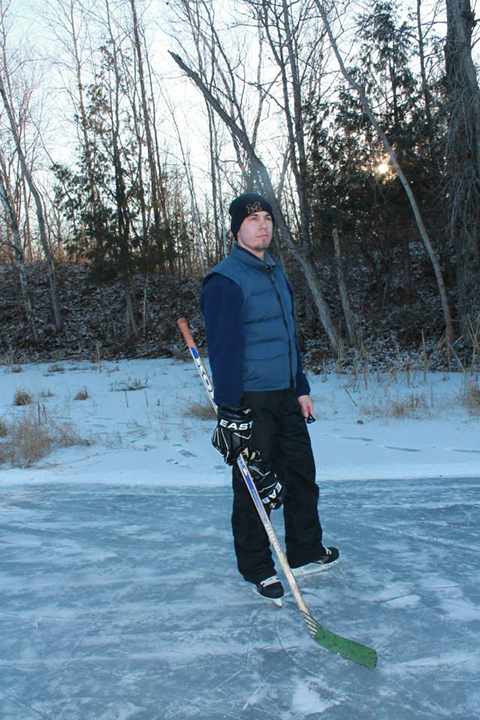 Jeff playing ice hockey outdoors