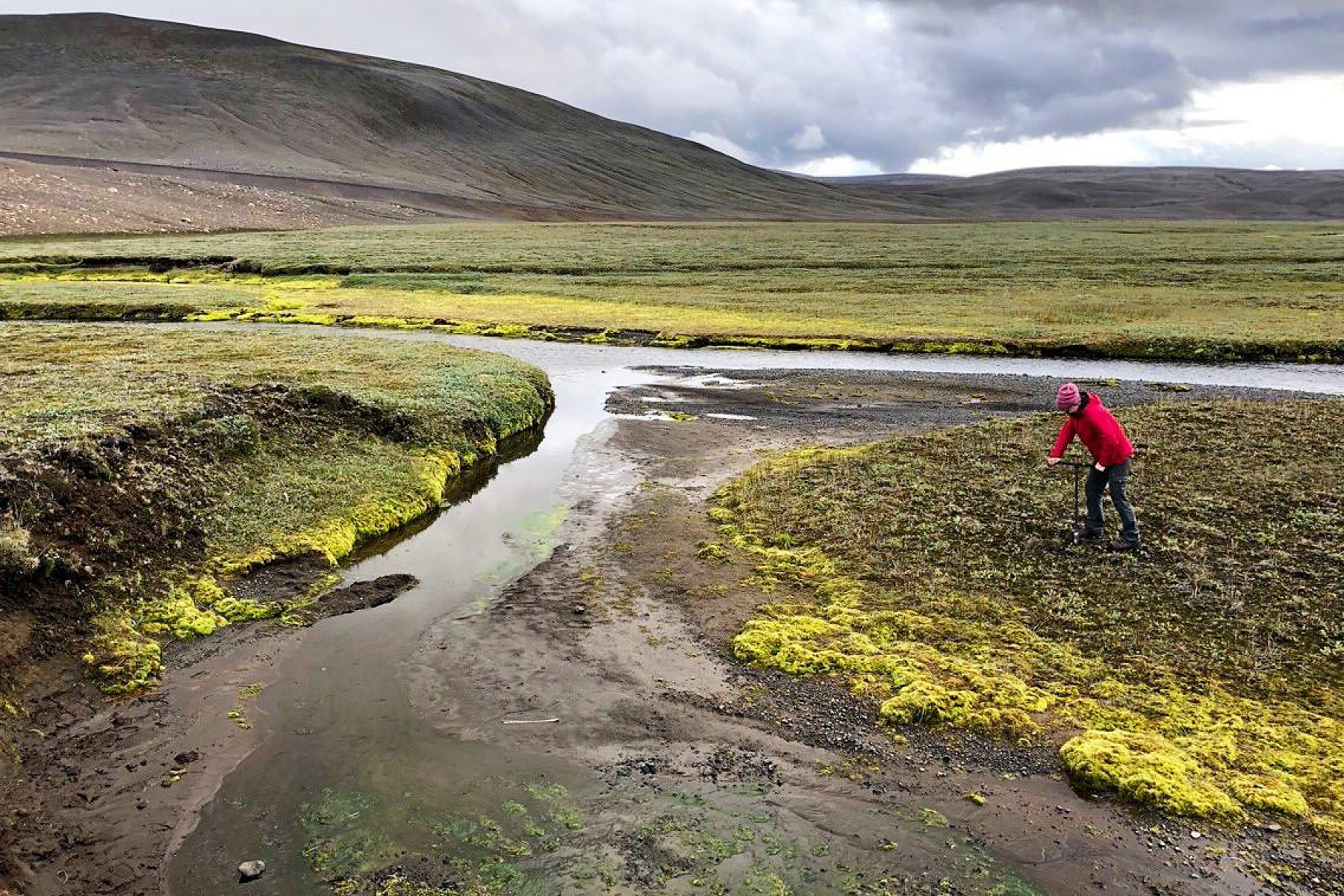 Rebecca Dzombak collects samples in Iceland.