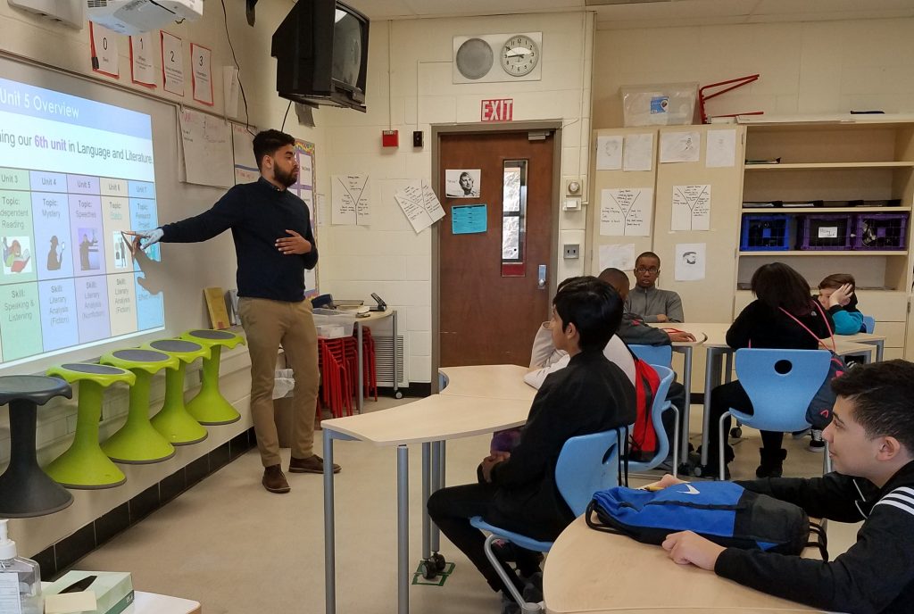 Muneer Khalid teaches in his classroom.