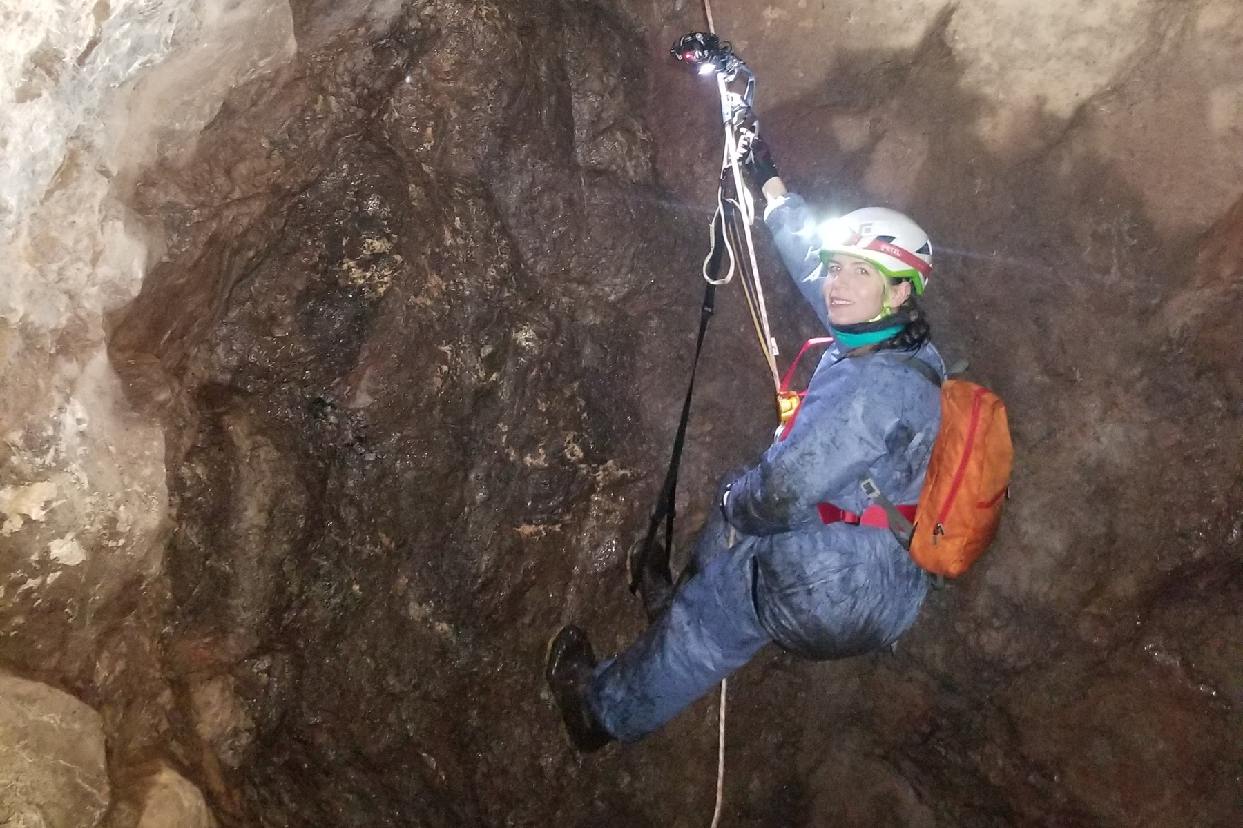 Giorgia Auteri hangs from a rope in an abandoned Michigan mine.