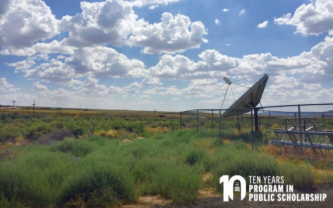 A satellite dish stands in a fenced area surrounded by grassland under a partly cloudy sky; “10 Years Program in Public Scholarship” text is overlaid in the bottom right corner.