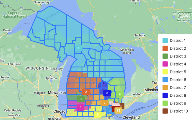 Map showing Michigan's voting districts in various colors, including labeled numbers 1 to 13, with a key on the right indicating corresponding colors for each district.