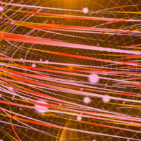 Abstract image with swirling lines and dots in red, orange, and yellow hues on a dark background, resembling a dynamic data or energy flow.