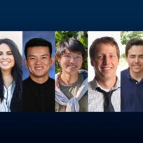 A lineup of seven people standing side by side, each smiling, with various backgrounds.