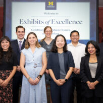 A group photo of graduate student presenters at Rackham's Exhibitions of Excellence Event.