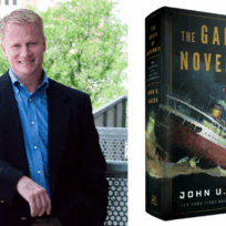 John U. Bacon in a suit stands on a balcony next to the cover of his book titled "The Gales of November."