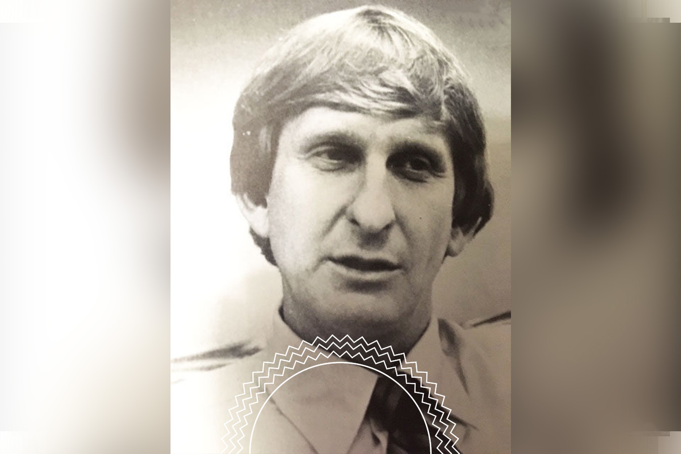 Black and white portrait of a middle-aged man with light hair, wearing a collared shirt and tie, looking slightly to the side. A circular seal is partially visible at the bottom.