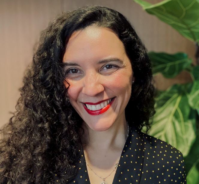Julianne Armijo smiles for the camera for an informal headshot.